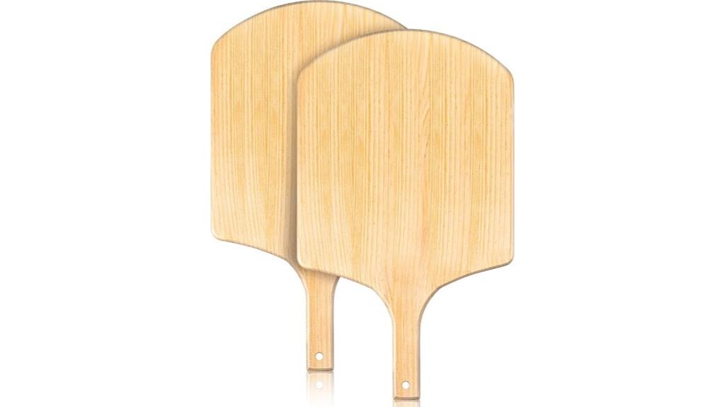 two wooden pizza paddles